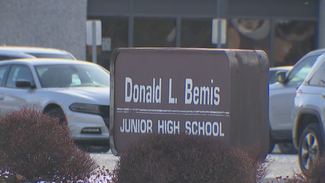 Man accused of driving into people outside school