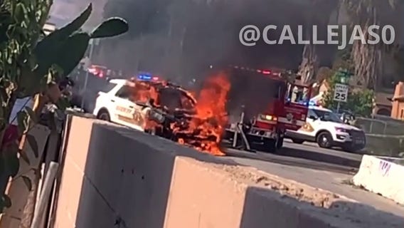 San Bernardino shooting: Witness shares video of burning cruiser