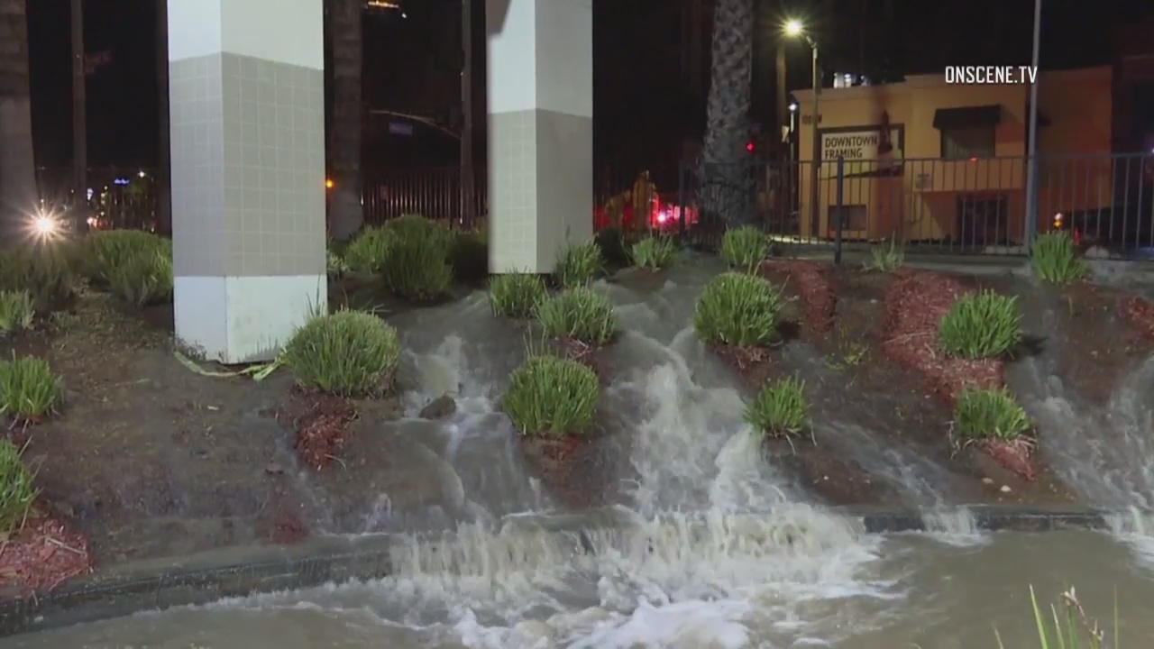 Busted water main floods Chinatown intersection