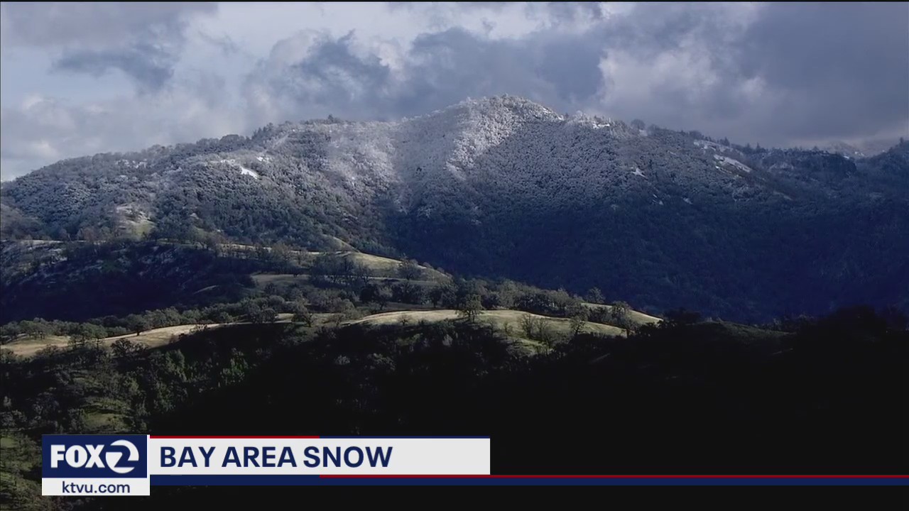 Snow sprinkled on Bay Area peaks