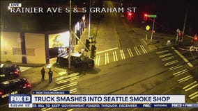Truck smashes into Seattle smoke shop