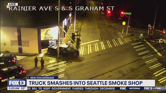Truck smashes into Seattle smoke shop