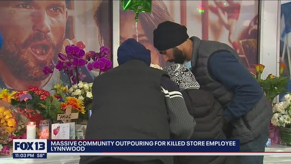 Nearly 200 people gather for vigil remembering gas station worker killed in Lynnwood