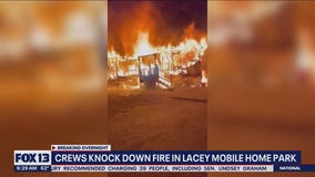 Crews knock down fire in Lacey mobile home park