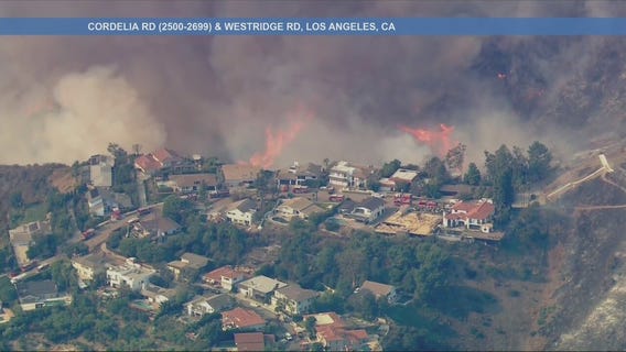 Fire threatens homes in Brentwood