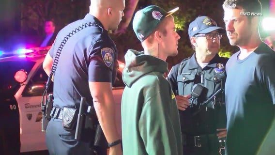 Paparazzo clipped by Justin Bieber's truck in Beverly Hills