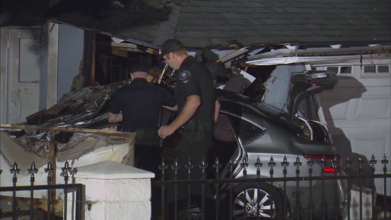 Power lines down after fiery car crash into Covina home
