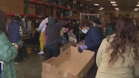 Long lines for Thanksgiving food giveaways show increased need