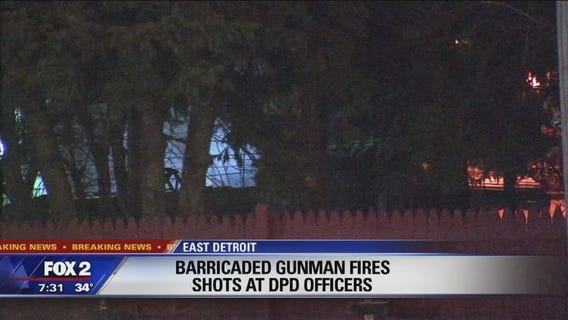 Barricaded gunman fires shots at Detroit police officers