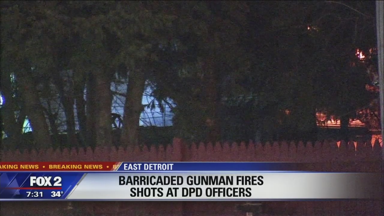 Barricaded gunman fires shots at Detroit police officers