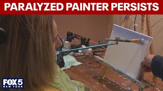 Paralyzed artist persists, continues to paint