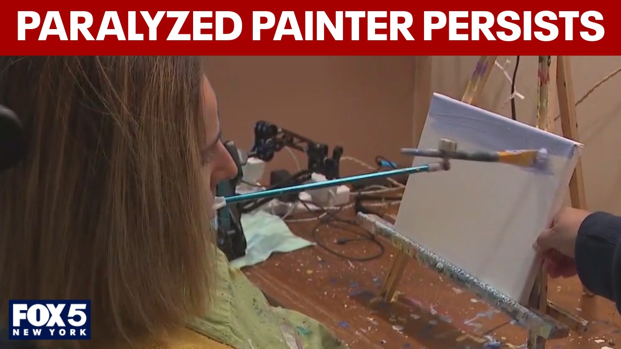 Paralyzed artist persists, continues to paint