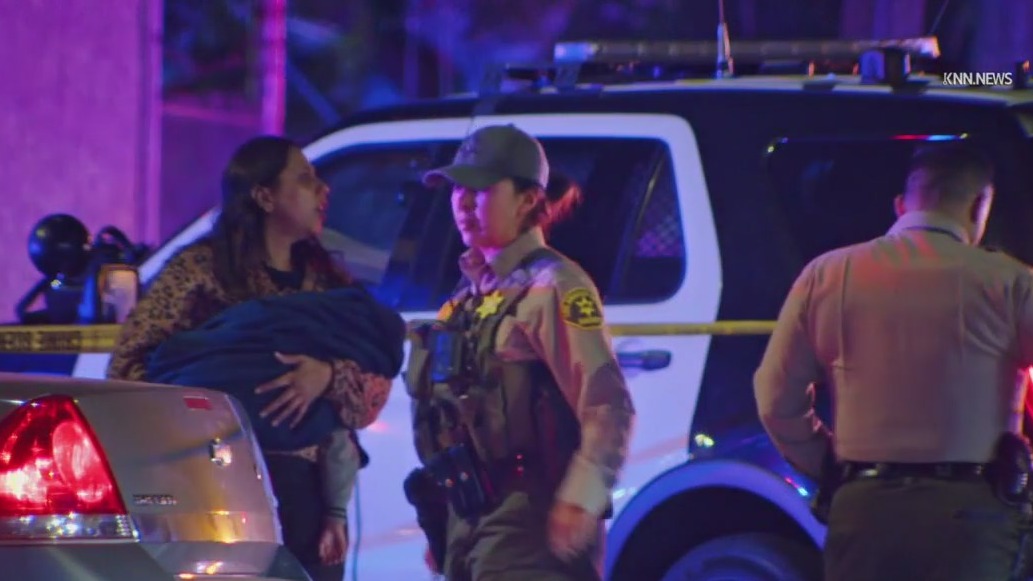 Suspect holding baby shot dead by deputies