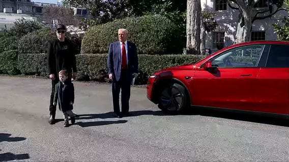 Donald Trump buys a Tesla from Elon Musk at White House [RAW]