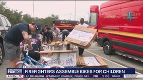 Seminole County firefighters build bikes for kids