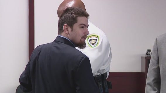 Man charged in deadly strip club crash stands trial
