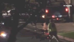 Man with tire iron shot by police