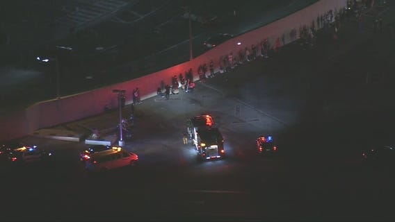 More than a dozen people spotted lining LAX tarmac