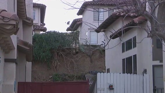 Retaining wall collapses, threatening Corona homes