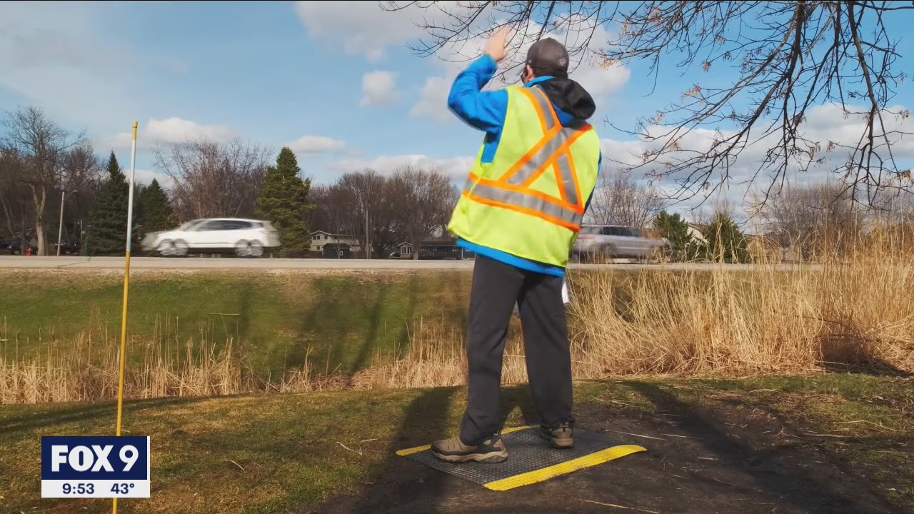 Minnesota man with autism brings smiles waving to passing traffic