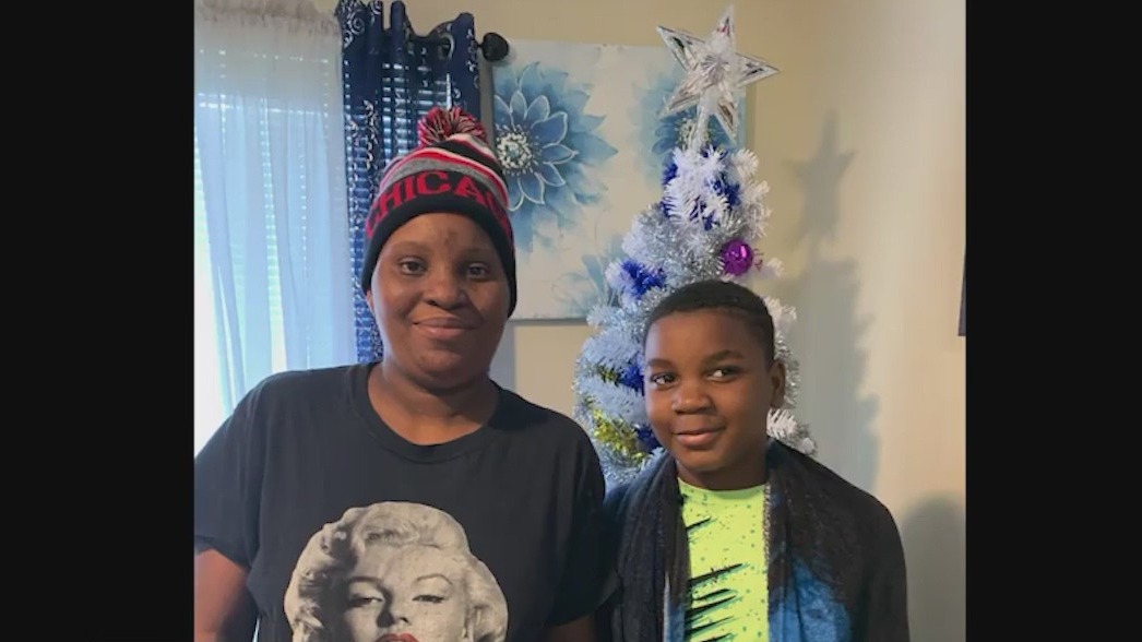 Woman, boy rescued from icy suburban pond