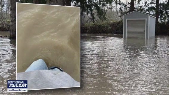 White River levee fails, flooding Pacific, WA