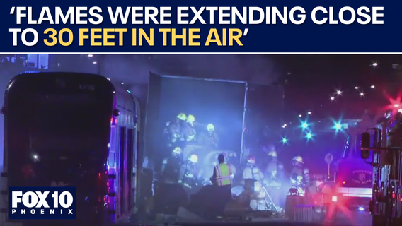 Fiery light rail, tractor trailer crash sends flames into the air