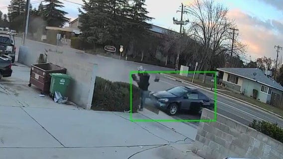 Man narrowly avoids skidding car