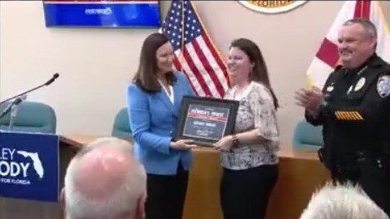 Sen. Moody honors volunteer Brevard County 911 operator