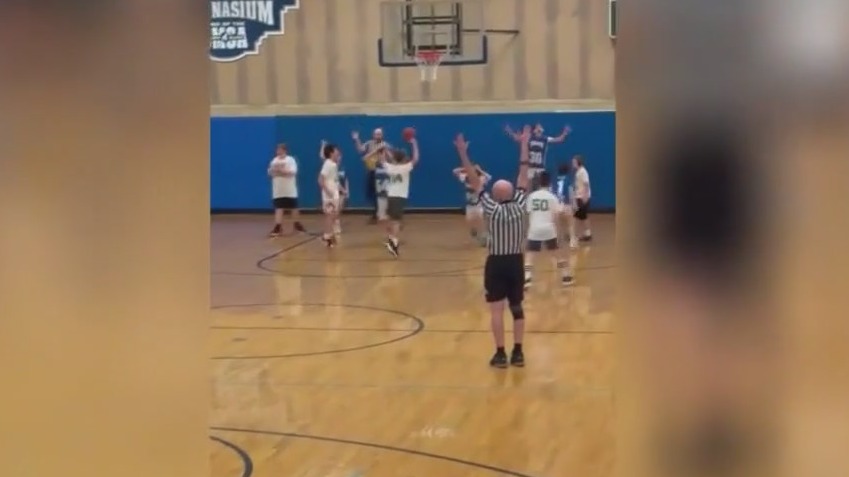 Opposing team helps player make basket