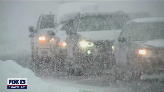 Early spring snowfall hampers drivers on Snoqualmie Pass
