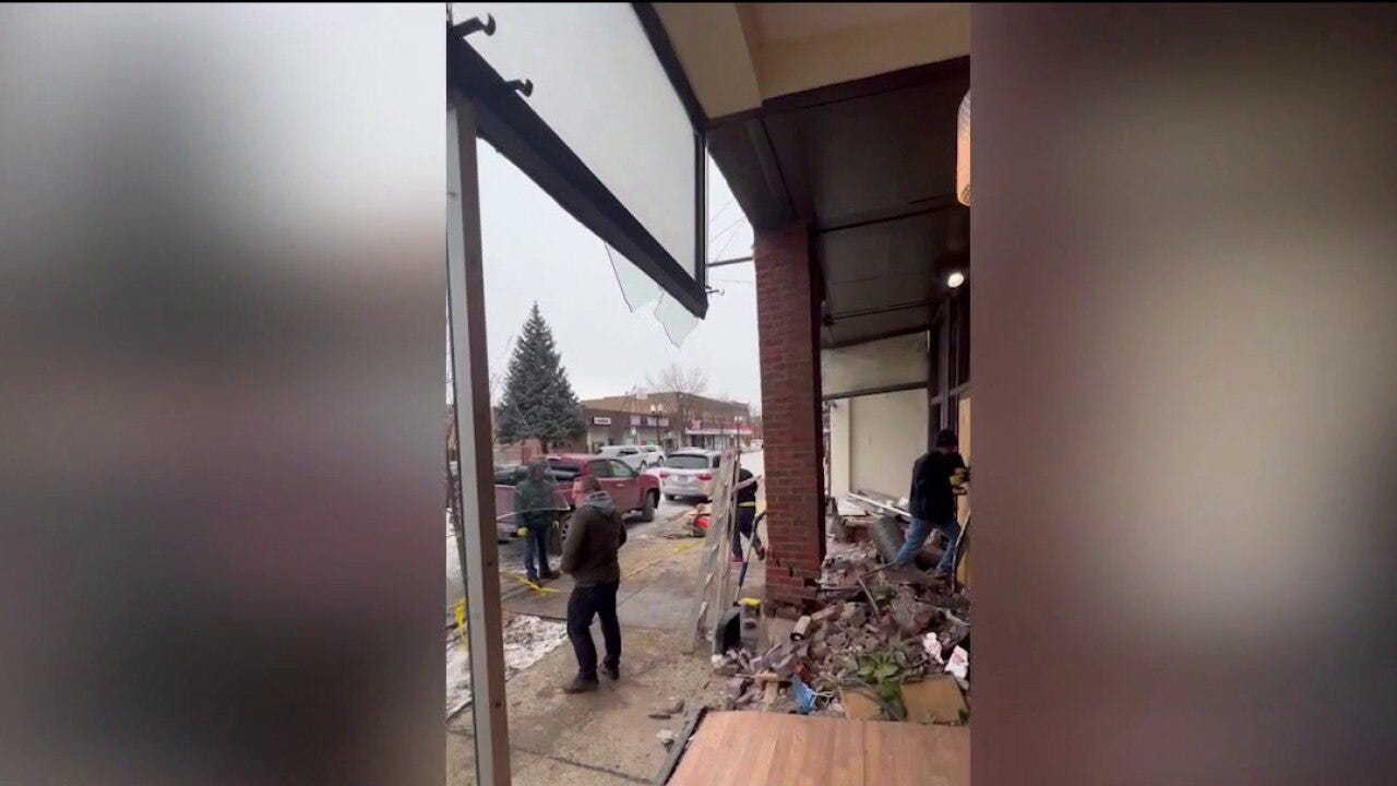 SUV crashes into Beverly record store