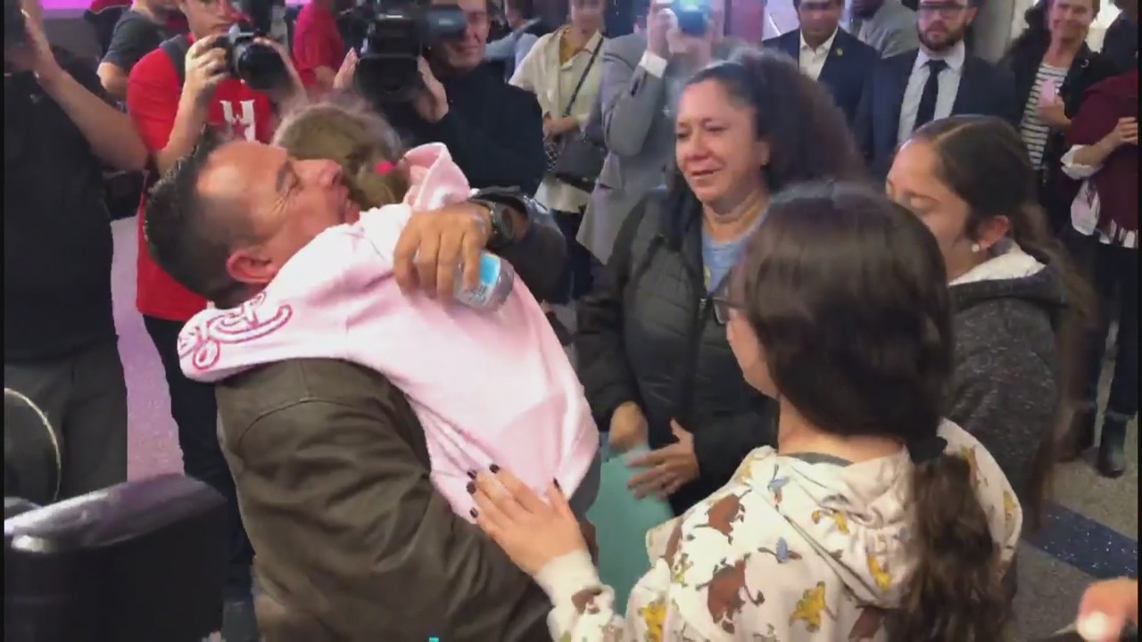 Deported parents reunite with children at LAX