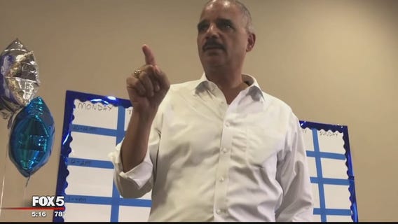 Former Attorney General Eric Holder draws criticism for 'When they go low, we kick them' comment
