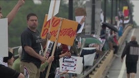 Protest against ICE raids held at Lake Street Bridge