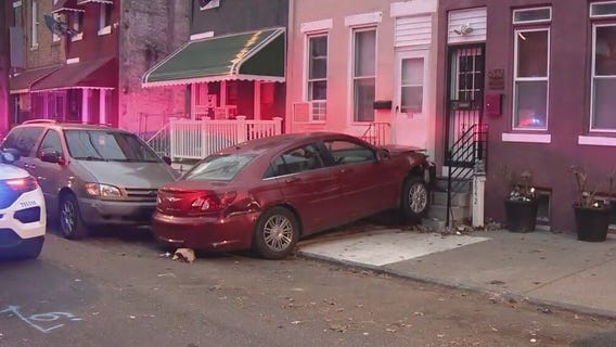 Neighbors recount scene of car crashing into house
