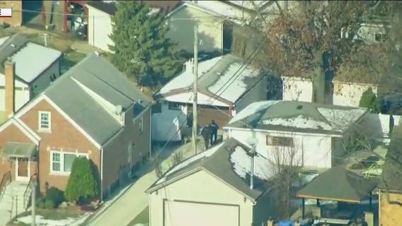Chicago police officers seen searching West Lawn neighborhood