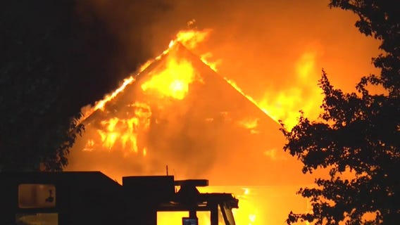 Standoff in Baytown ends with house fire