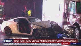 4 injured after car hits ambulance in Fairfax County