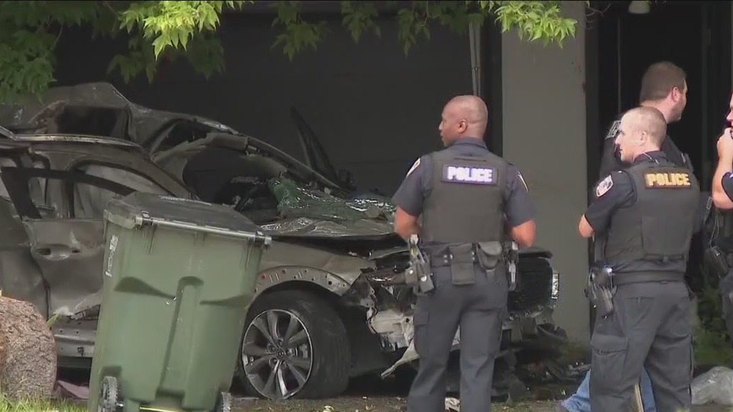 Police chase ends with crash into home