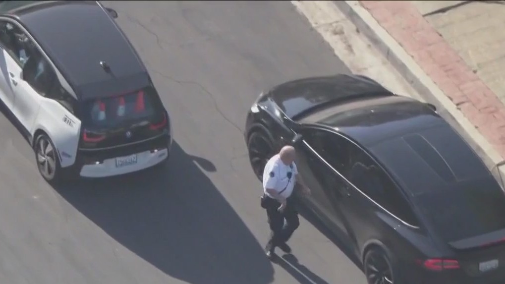 Bees swarm 2 men in Encino