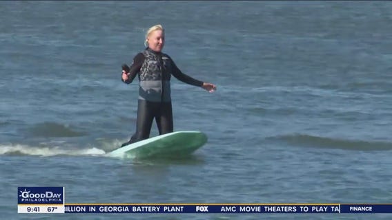FOX 29's Jenn Frederick floats above they bay on watercraft