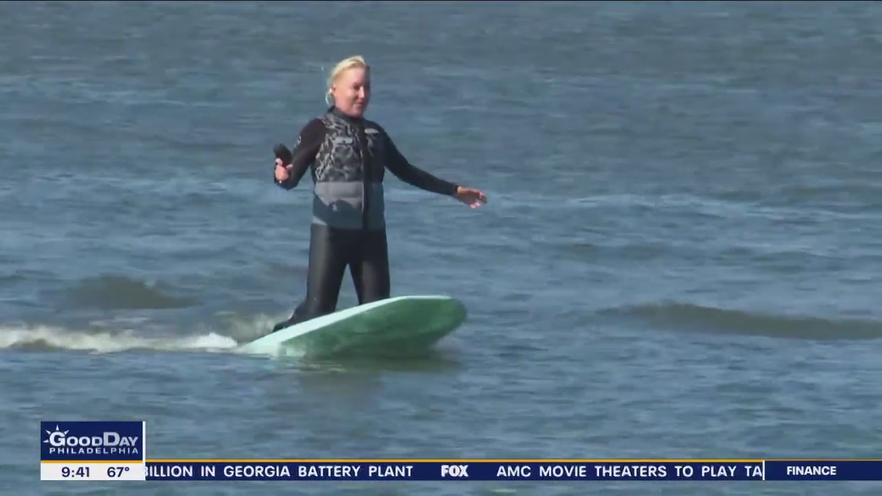 FOX 29's Jenn Frederick floats above they bay on watercraft
