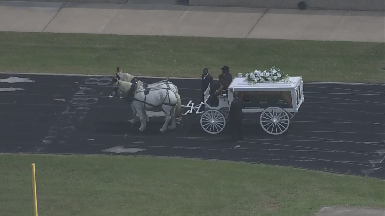 Horse-drawn carriage carries Spc. Vanessa Guillen's casket