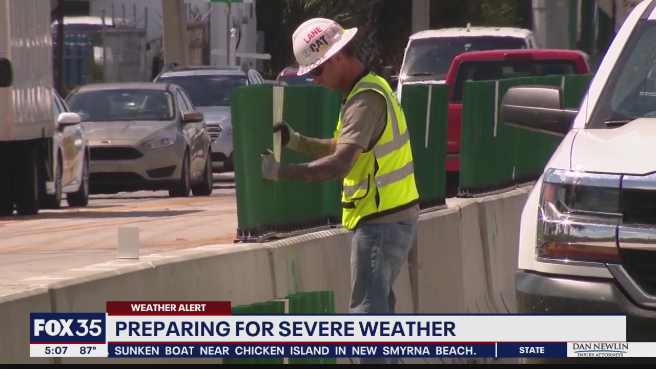 Utility crews and construction workers prepare for storms