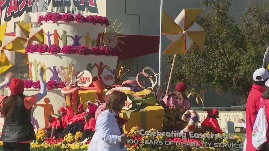 Spectators making their way to Pasadena for Rose Parade