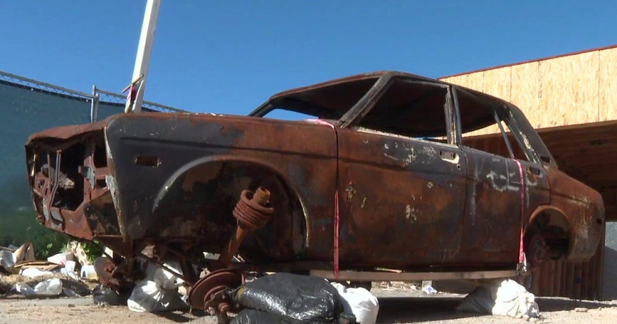 Man documents burned cars from LA fires