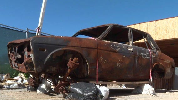 Man documents burned cars from LA fires