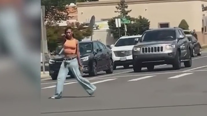 Across America: Video shows woman waving gun in middle of intersection