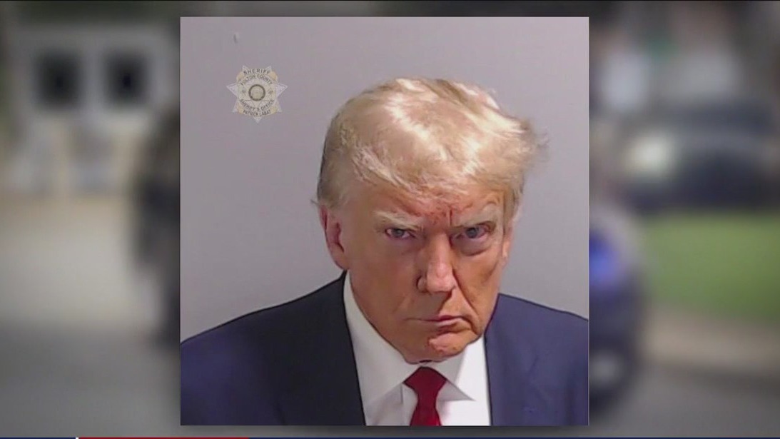 Donald Trump turns himself in, takes mugshot
